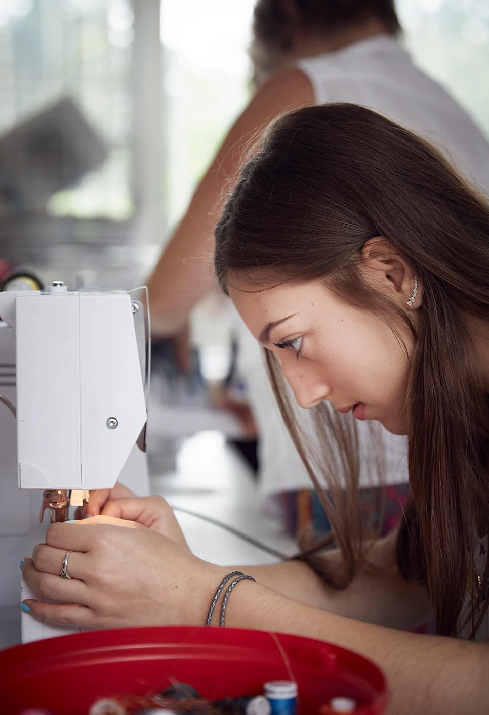 Girl sewing