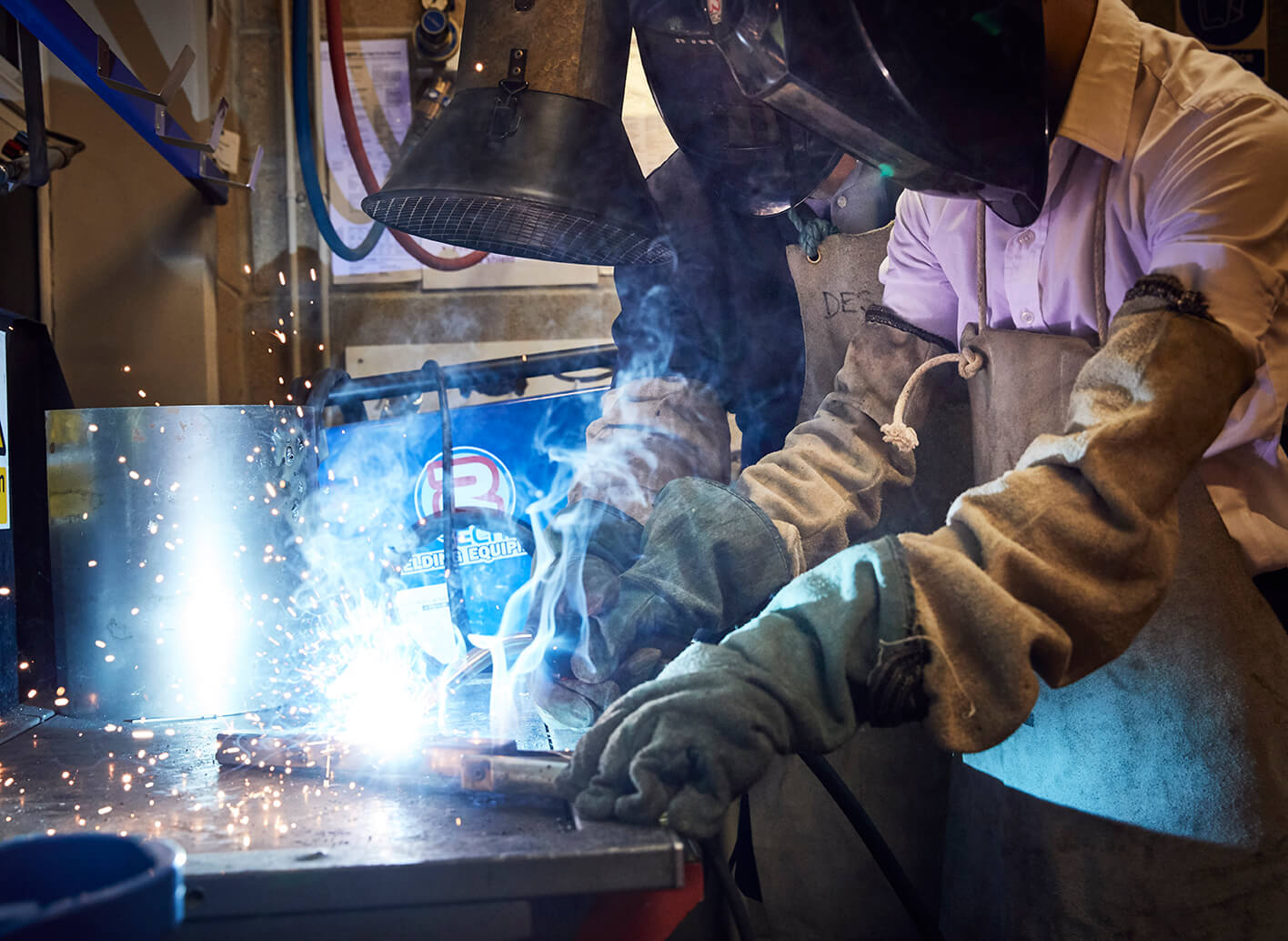 Student melting metal