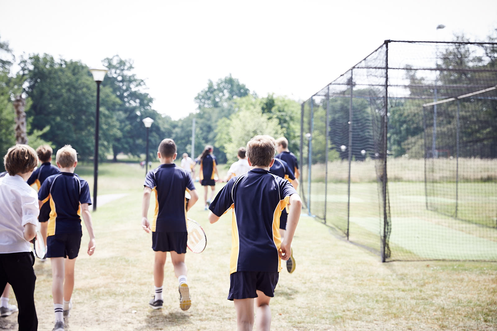 Boys going to play tennis