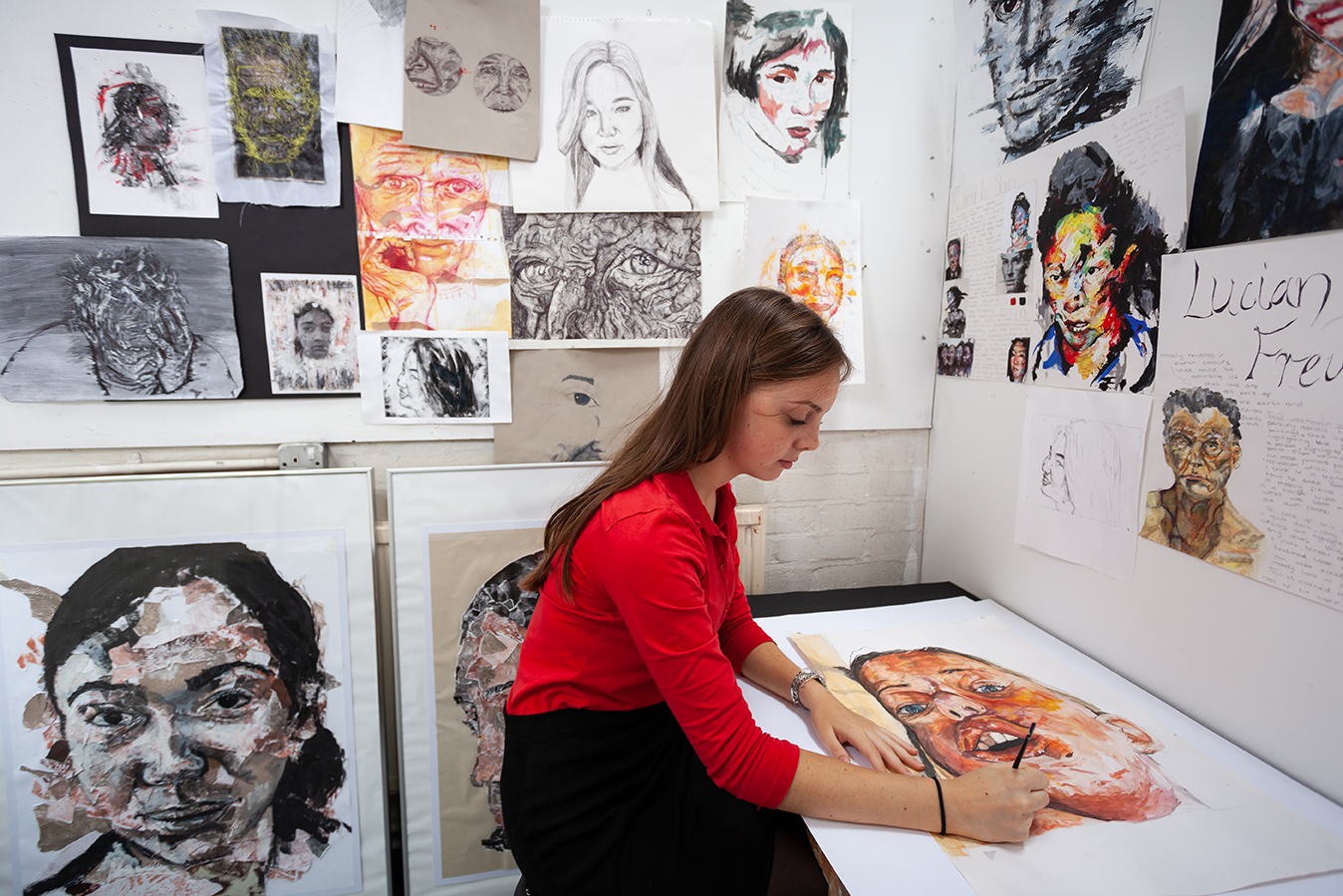 Girl painting a portrait