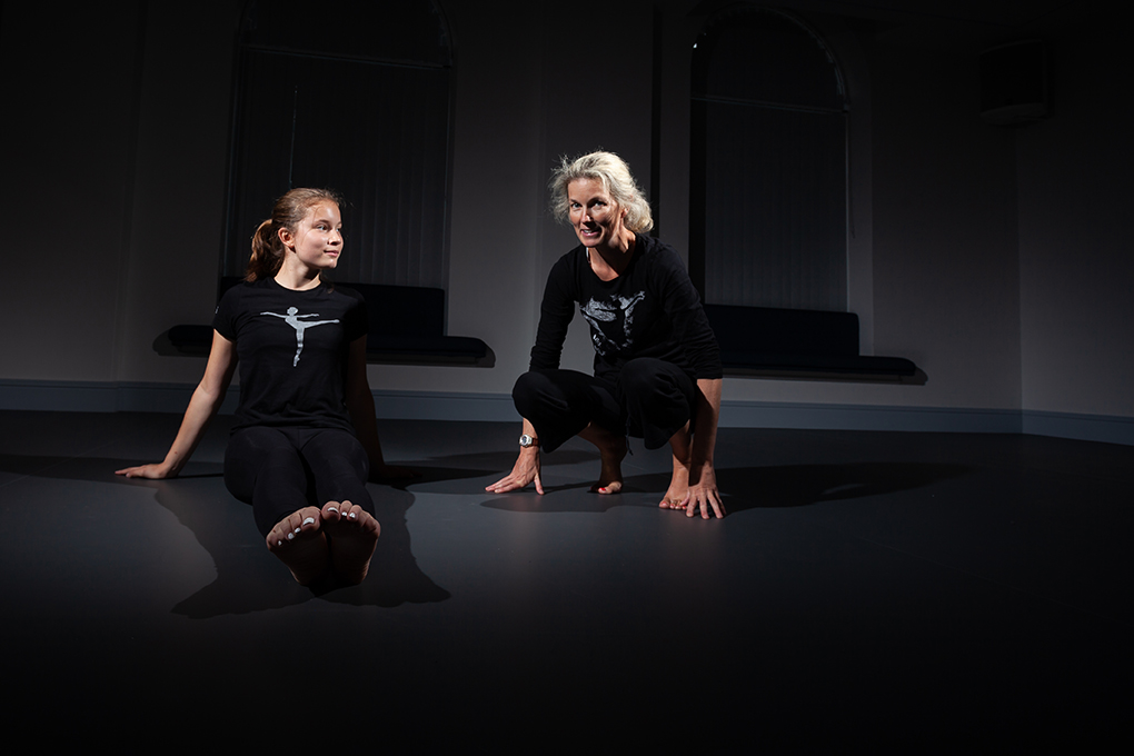 Student and teacher in dance class