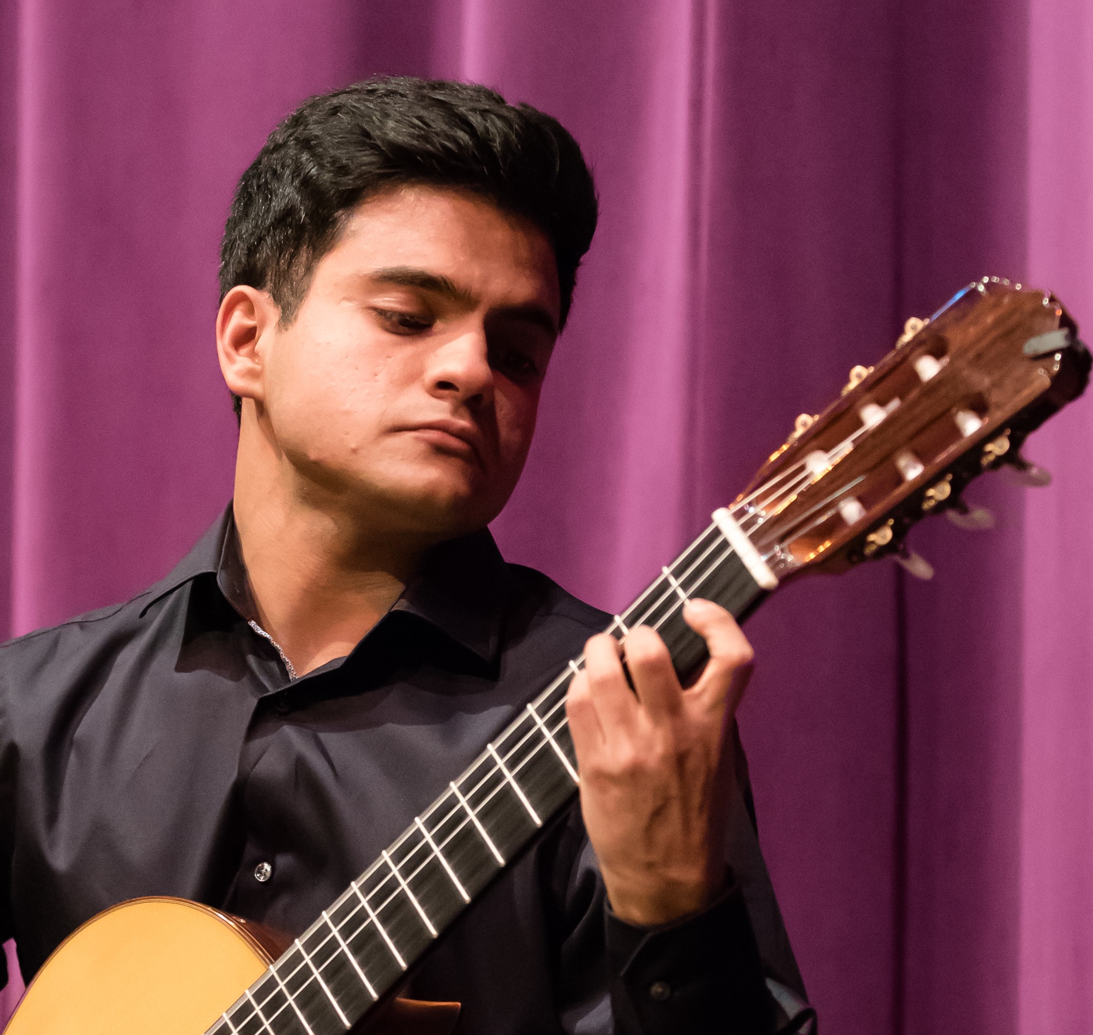 Ravi Nathwani playing guitar