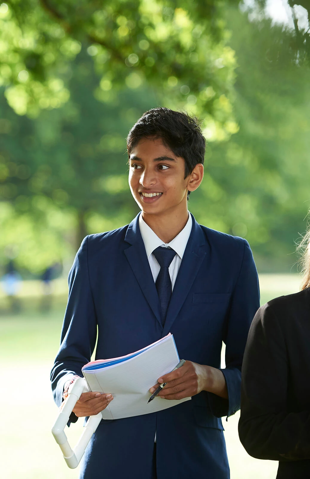 Boy wearing a blue suit