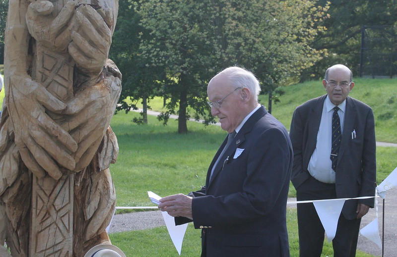 man reading a speech