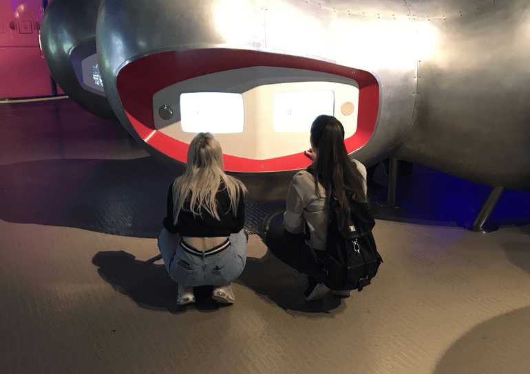 AS Psychology students looking at exhibit