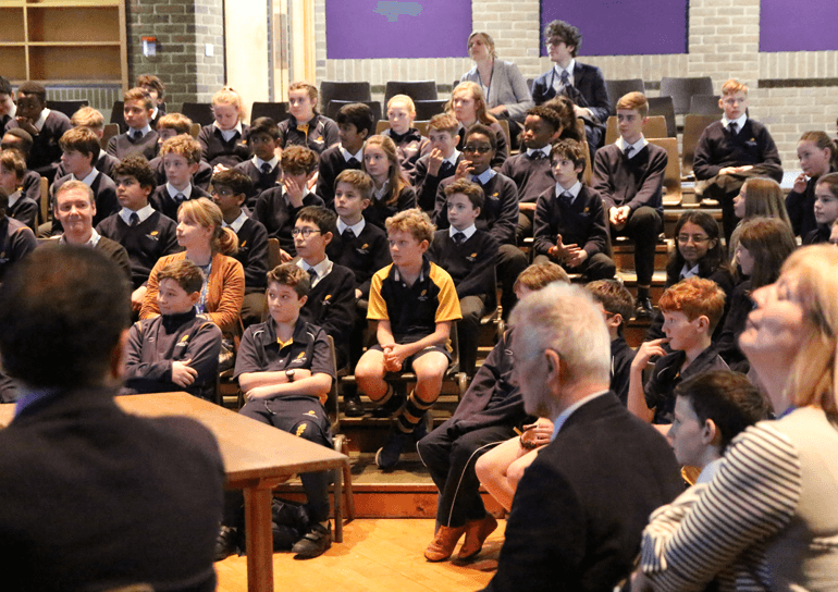 Year 7 and 8 pupils sitting in hall at the Change Champions initiative