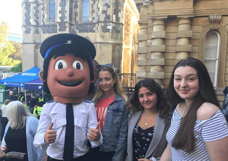 Three A Level Psychology students outside Reading Crown Court