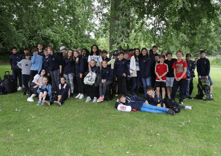 Year 7 pupils under tree in France