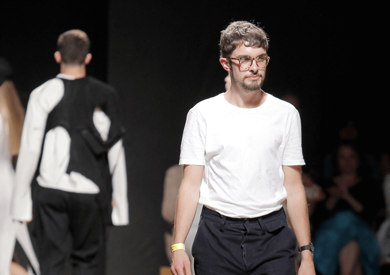 Old Leightonian, Archie Dickens on catwalk at Vogue Portugal’s “New Blood” show in Lisbon
