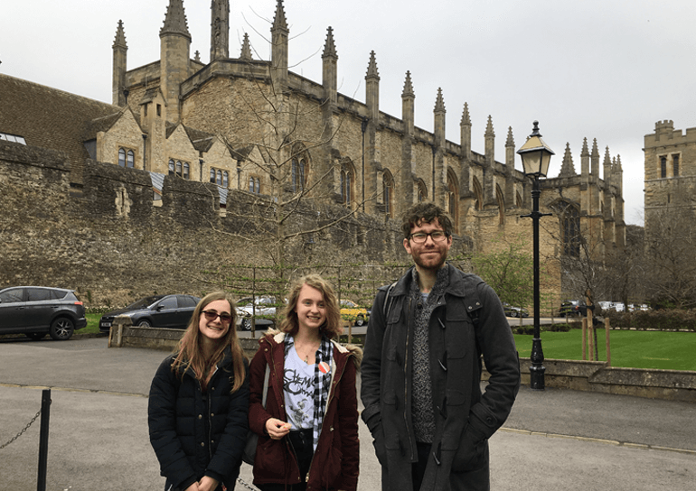 Three Leighton Park students stand in front of Oxford University building at Salter’s Festival of Chemistry