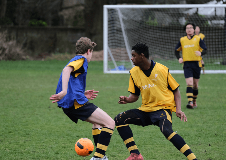 Leighton Park boys on a football pitch