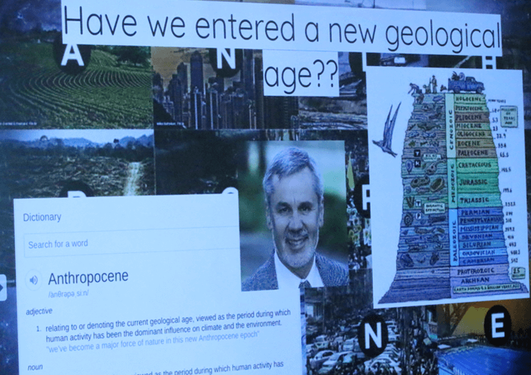 Photograph of screen showing images and text answering have we entered a new geological age