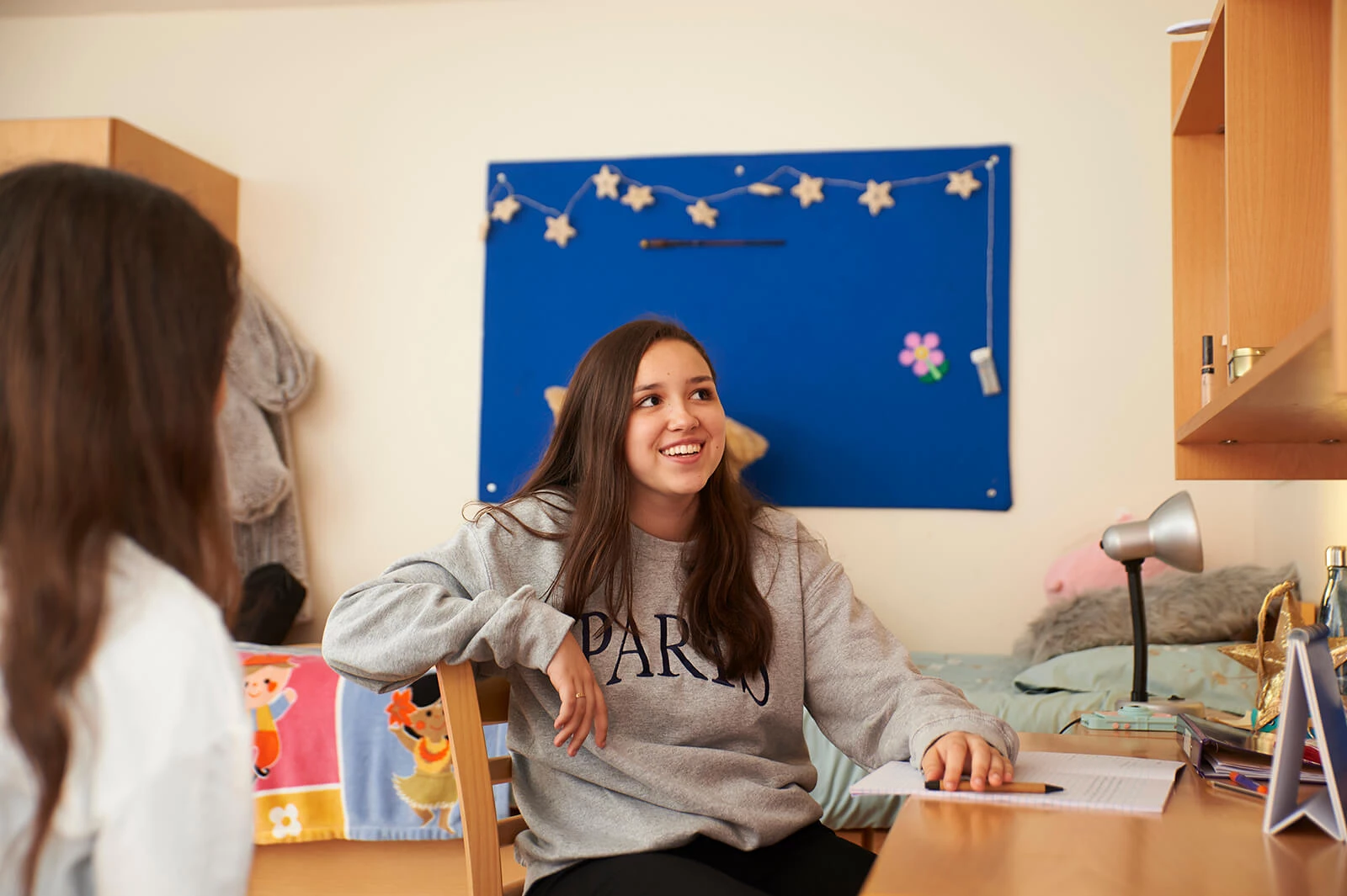 Girl smiling in her room