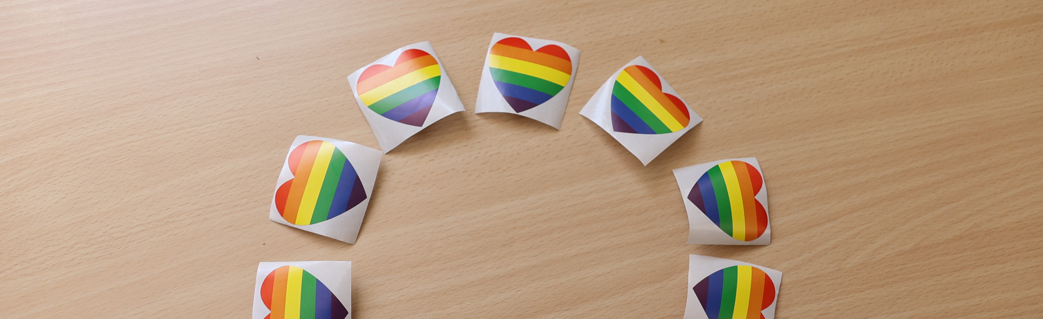 Rainbow heart stickers in a circle