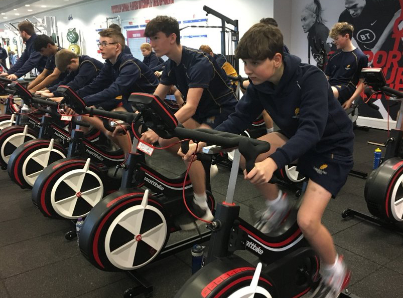 students using well being exercise bikes